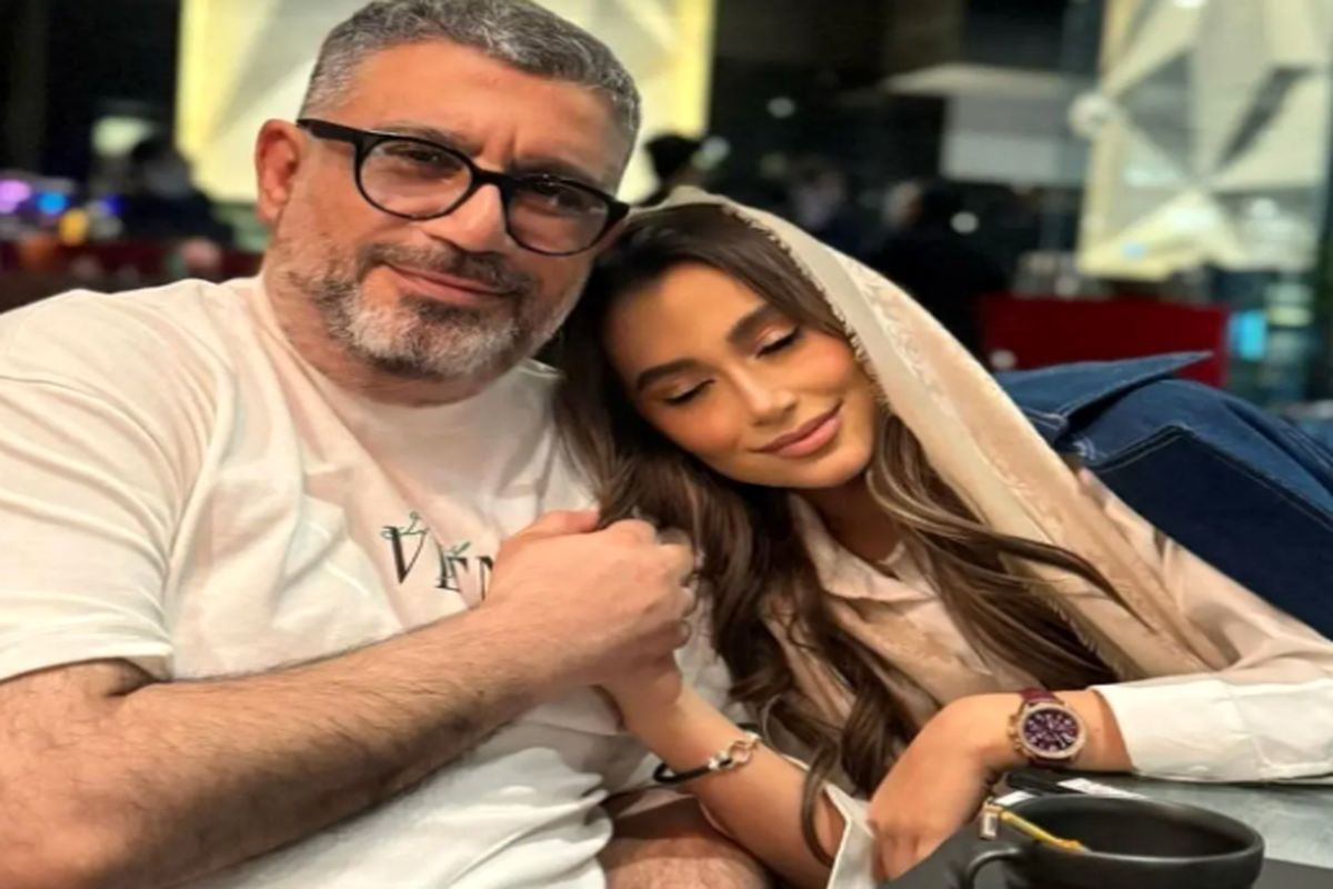 بوسه محبت آمیز رضا رشیدپور بر دستان دخترش هلن/ ببینید