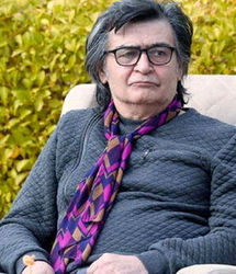 رضا رویگری در پشت‌صحنه «یوزپلنگ» در کنار جمشید هاشم‌پور