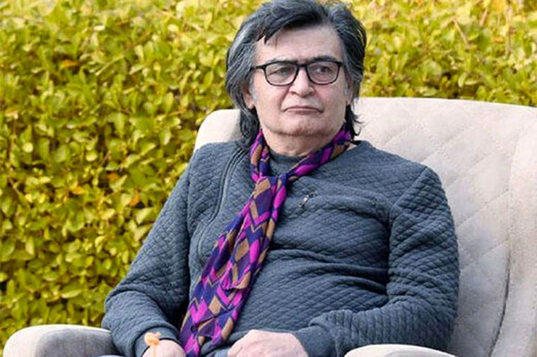 رضا رویگری در پشت‌صحنه «یوزپلنگ» در کنار جمشید هاشم‌پور